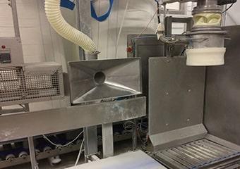 Hotte de dépoussiérage sur station de remplissage de sacs